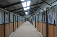 nieuwbouw manege met inpandige woning Ospel